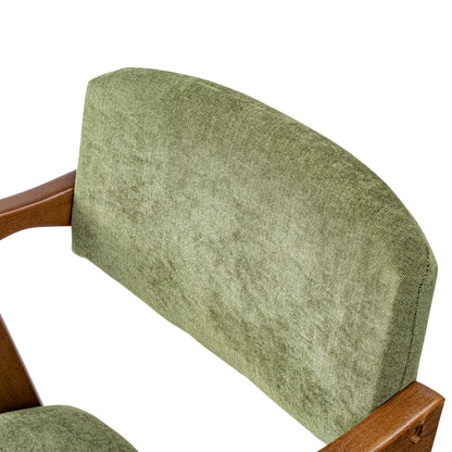 Close-up of a chair with a textured sage green fabric backrest and wooden armrests on a white background.