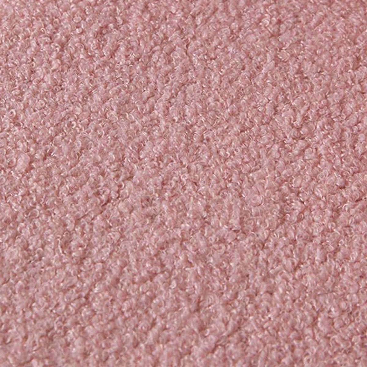 A close-up texture shot of a dusty pink loop pile fabric, showing the detailed curly fibers and soft sheen.