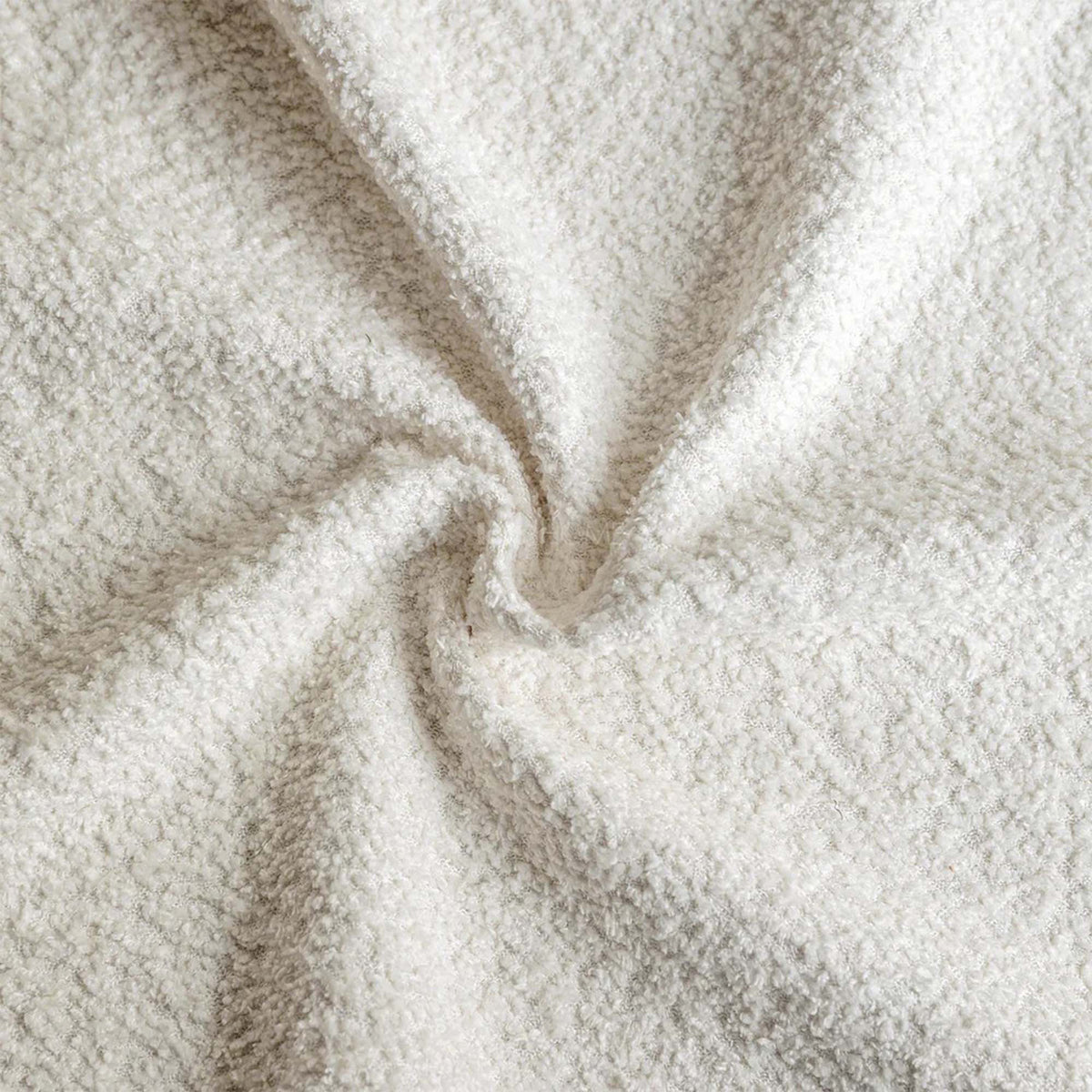 Close-up of beige fleece fabric with a soft texture