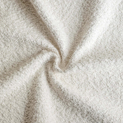 Close-up of beige fleece fabric with a soft texture