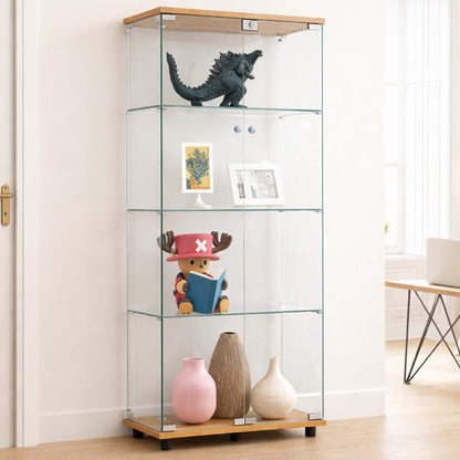 A tall glass display cabinet with a light wood base and top, shown in a bright room. The cabinet has four glass shelves and is styled with a dark blue dinosaur figurine, a small framed print, a teddy bear wearing a red pirate hat and holding a blue book, and three vases on the bottom shelf.