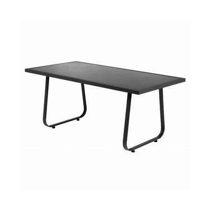 A modern rectangular desk with a black top and black metal legs with curved U-shaped supports, shown on a plain white background.